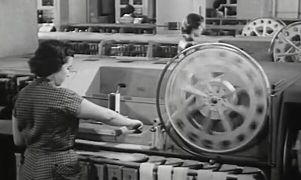 black and white woman working in a factory