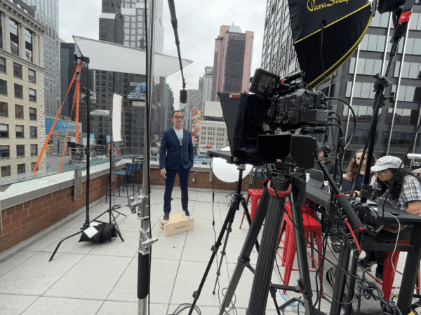 man on roof in video production shot